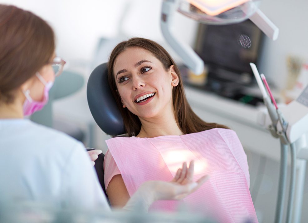 Woman smiling in the dental chair