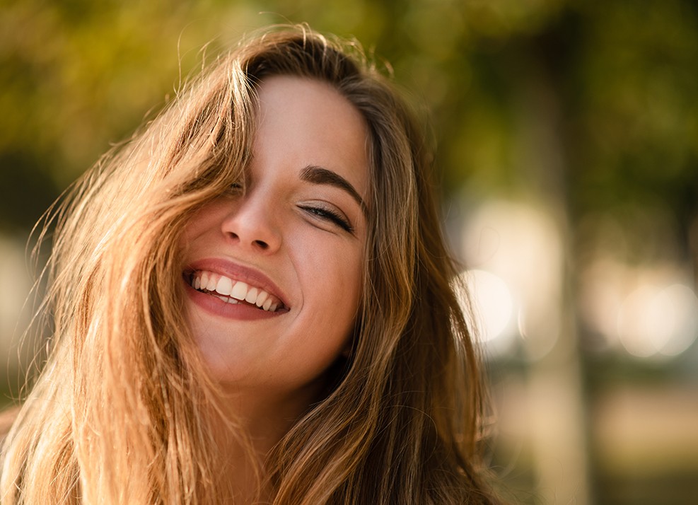 Woman smiling outside