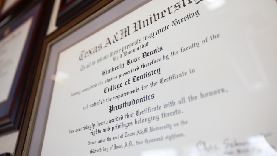 Close up of framed Certificate in Prosthodontics from Texas A and M University for Doctor Kimberly Rose