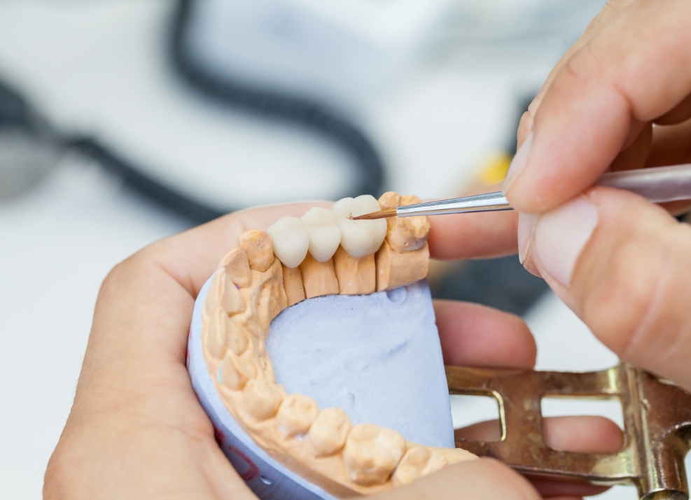 Person designing a dental crown