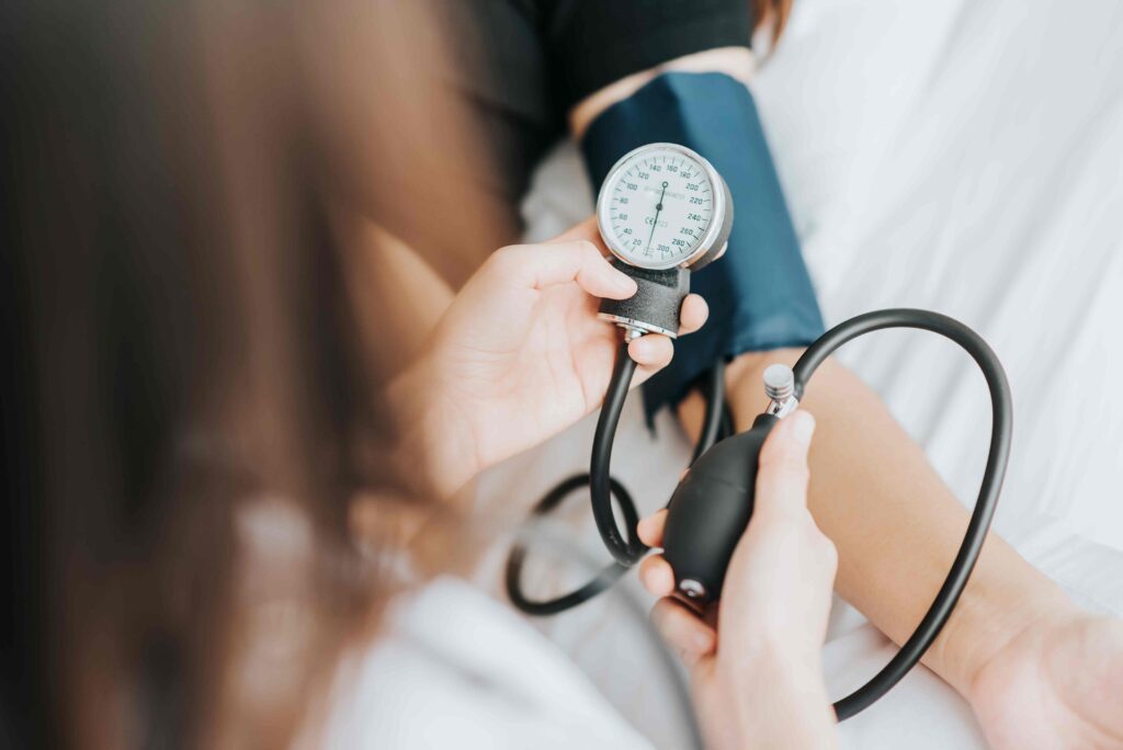 Woman taking blood pressure